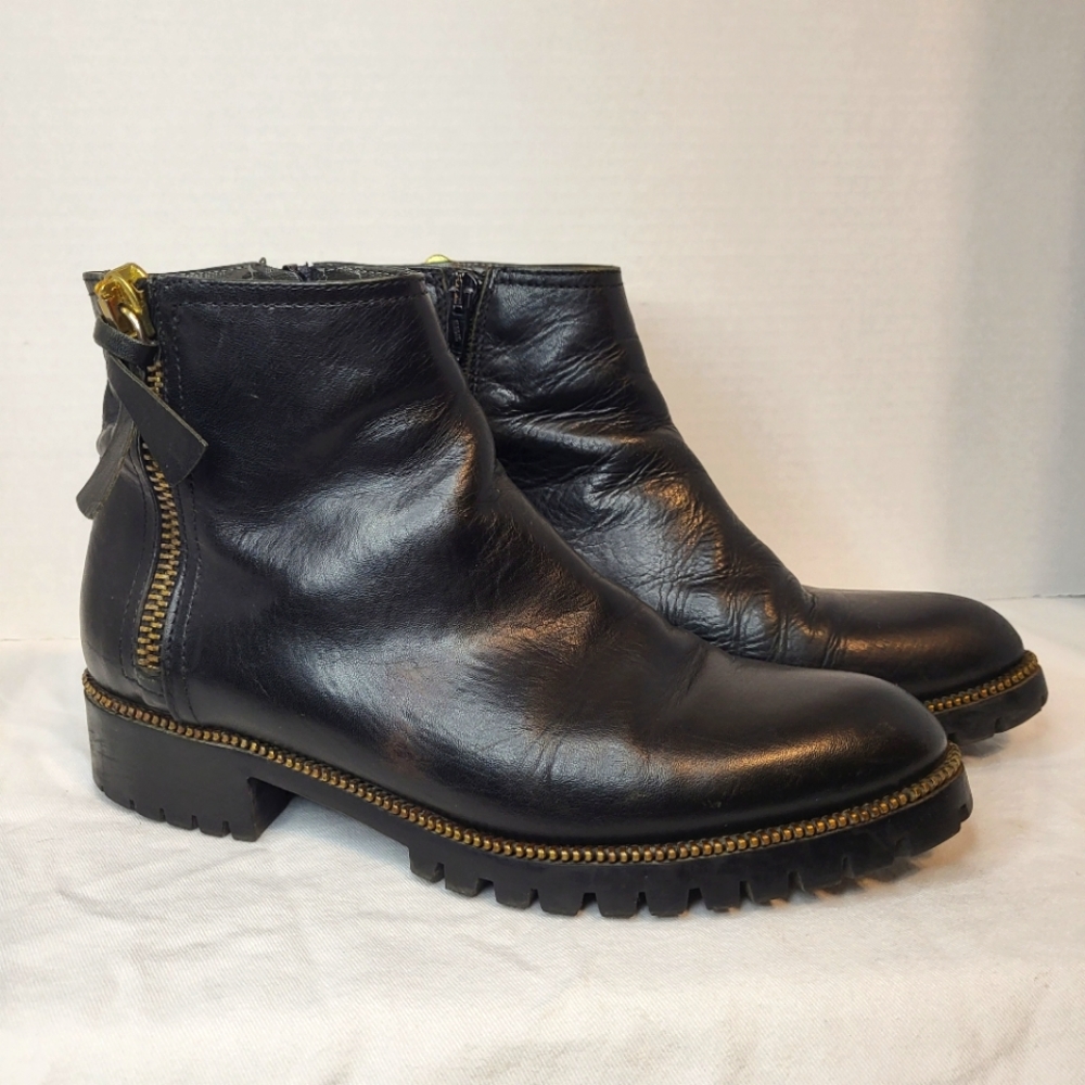 Napoleoni black leather pointed toe pull on zipper ankle booties.  Size 37